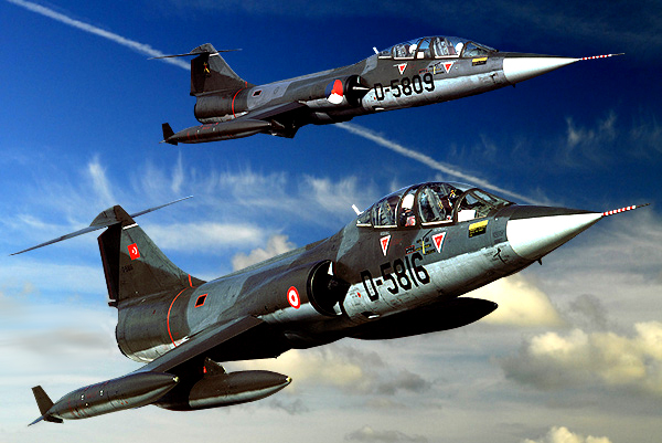 DIGITAL ART  2 F-104-G Starfighters in formation the D-5816 Prepering for Delivery to the Turk AF  and in the rear the TF-104G D-5809 in the 323 colours  25-08-1980