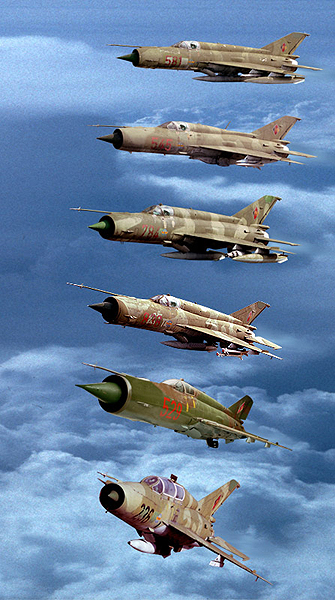 DIGITAL ART  Formation of East German MiG-21`s.  The MiG-21-US the 236 of FAG-15.  no-2 MiG-21-MF the 529 of JG-9.  no-3 MiG-21-Bis the 838 of JG-8.  no-4 MiG-21-MF the 784 of FAG-15.  no-5 MiG-21-M the 581 also of FAG-15.  no-6 MiG 21-SPS-K the 545 of FAG-15.  Except the 529 witch is now on island of Rugen. All the aircaft are still on Rothenburg near the Polisch border.